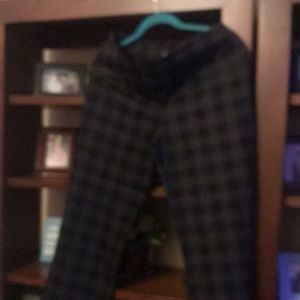 Black and grey checkered pull on pants. Size medium.
